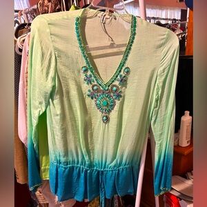 Blue and green women’s shirt